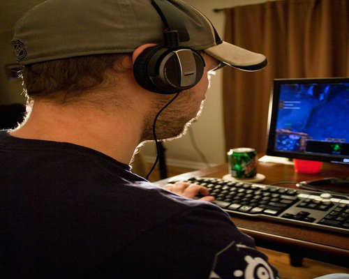Australian player behind dual monitors exploring a fictional CROWN online route